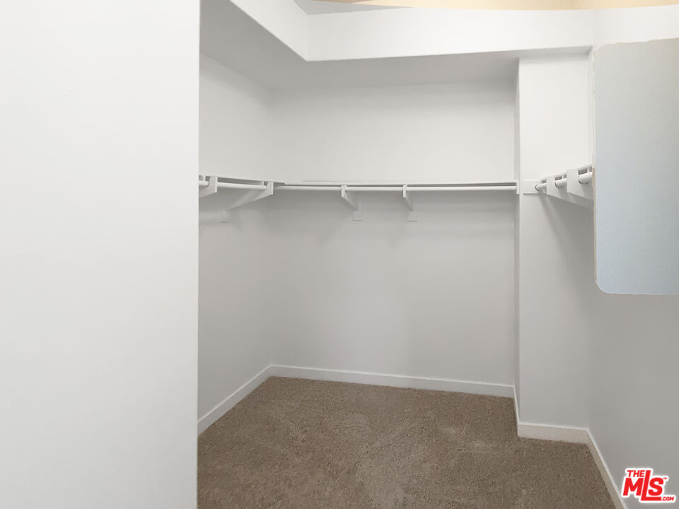 96 Marisol Street Rancho Mission Viejo, CA 92694 - Photo 15 of 26 a view of an empty walk in closet