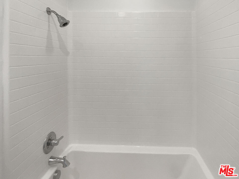 96 Marisol Street Rancho Mission Viejo, CA 92694 - Photo 17 of 26 a bathroom with a shower