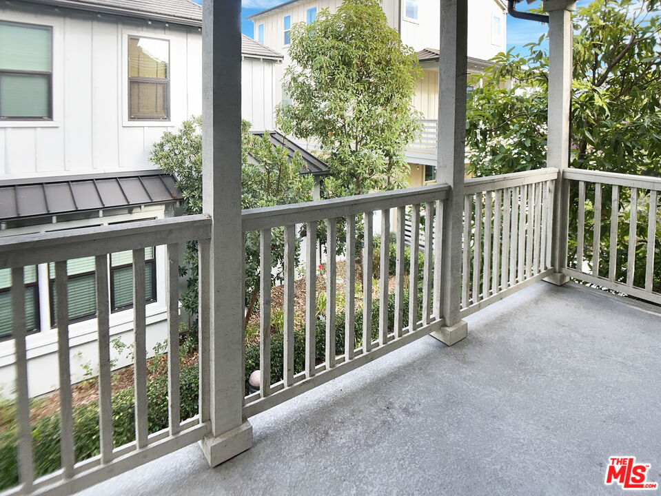 96 Marisol Street Rancho Mission Viejo, CA 92694 - Photo 7 of 26 a view of a balcony with wooden floor