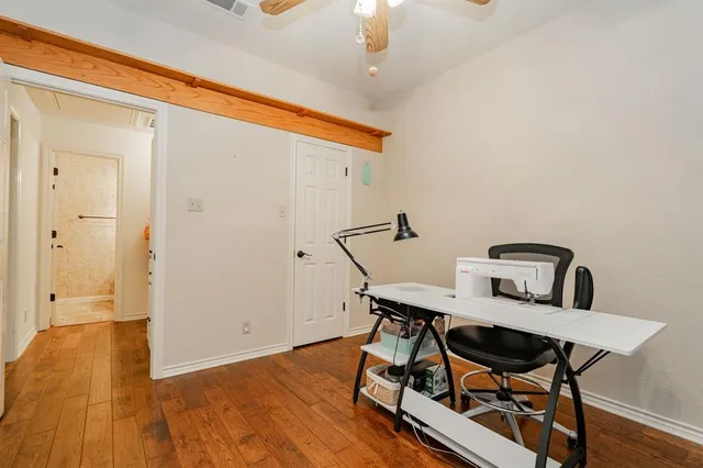 a view of a workspace with furniture