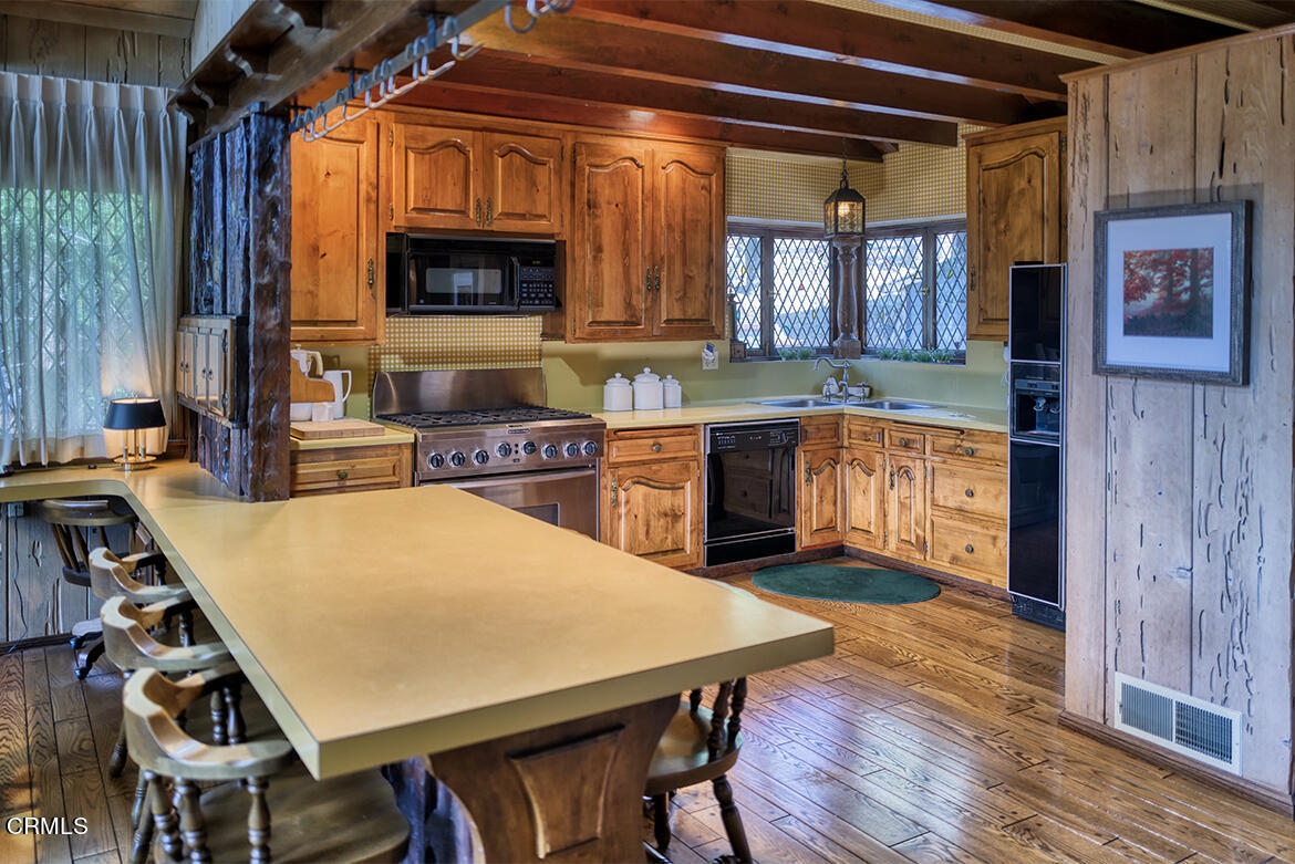 24749 Basel Drive Crestline, CA 92325 - Photo 12 of 54 a dining room with furniture and window