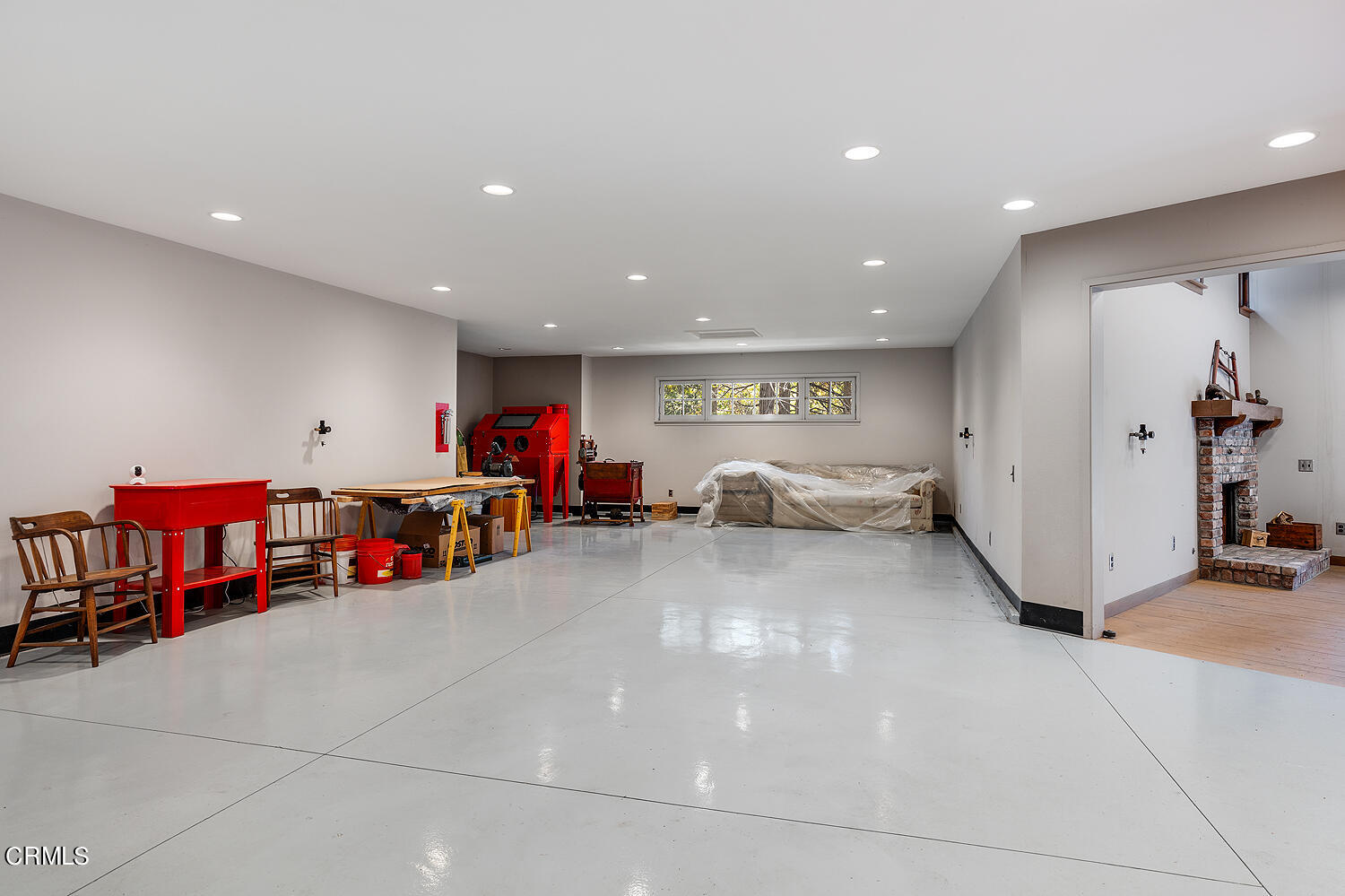 24749 Basel Drive Crestline, CA 92325 - Photo 26 of 54 a living room with lots of furniture and white walls