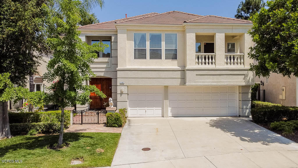 11691 Pinedale Road Moorpark, CA 93021 - Photo 1 of 37 a front view of a house with a yard and garage