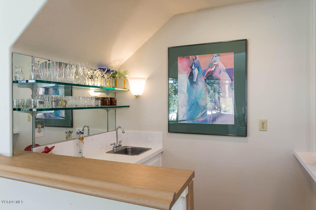 11691 Pinedale Road Moorpark, CA 93021 - Photo 16 of 37 a room with a sink and a mirror