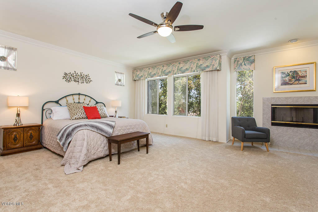 11691 Pinedale Road Moorpark, CA 93021 - Photo 17 of 37 a bedroom with a bed and a tv