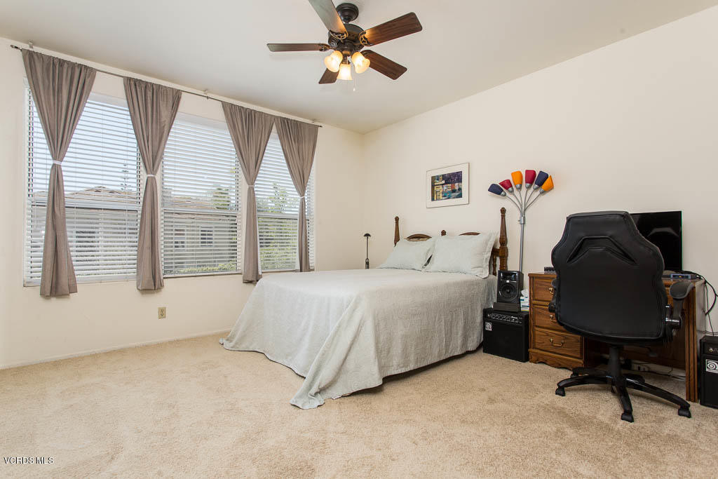 11691 Pinedale Road Moorpark, CA 93021 - Photo 25 of 37 a bedroom with a bed dresser and a window