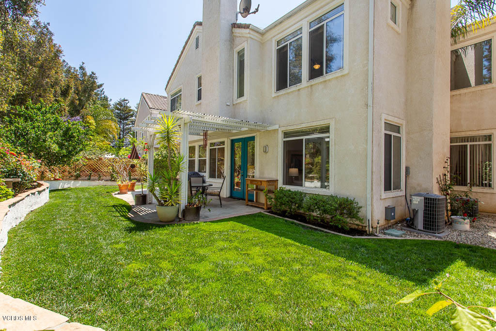 11691 Pinedale Road Moorpark, CA 93021 - Photo 28 of 37 a view of a house with backyard and porch