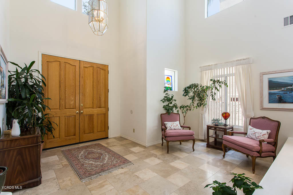 11691 Pinedale Road Moorpark, CA 93021 - Photo 5 of 37 a living room with furniture and a potted plant