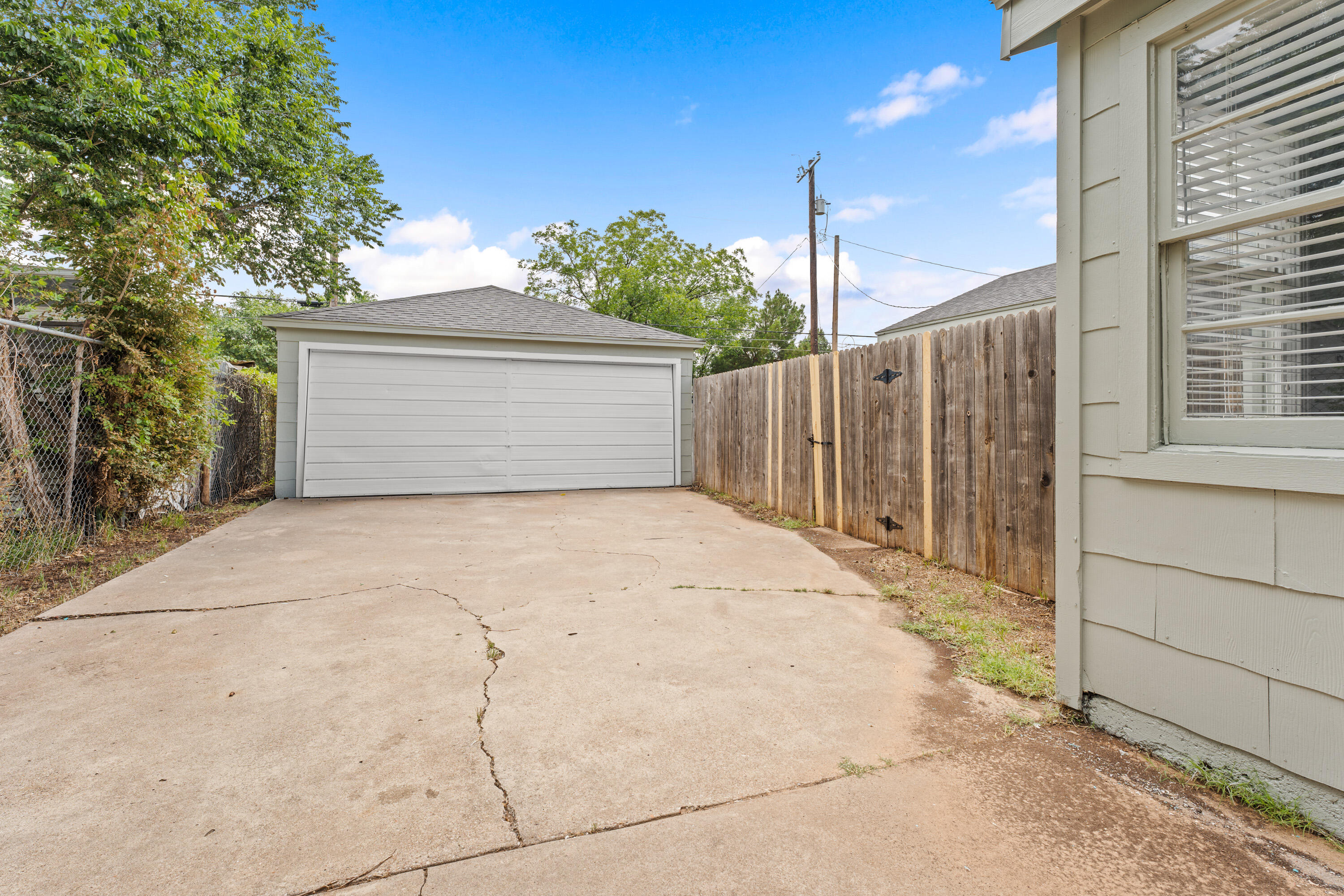 3313 26th Street Lubbock, TX 79410 - Photo 21 of 21 a view of a house with a garage