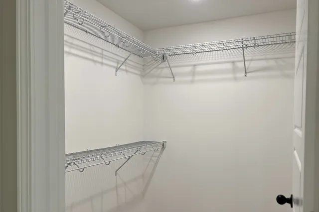 a view of a room with racks on the wall