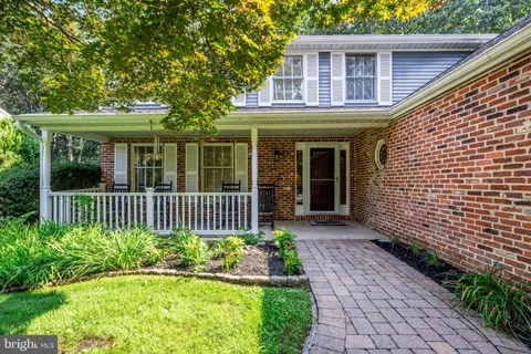 a front view of a house with a porch