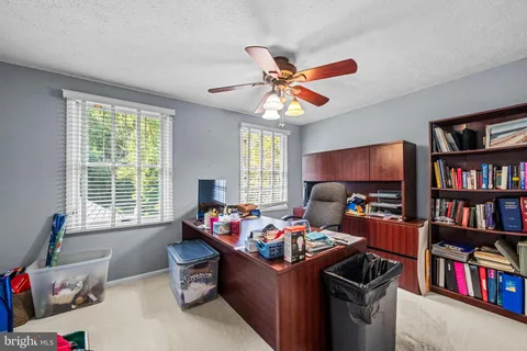 a room with furniture toys and a window