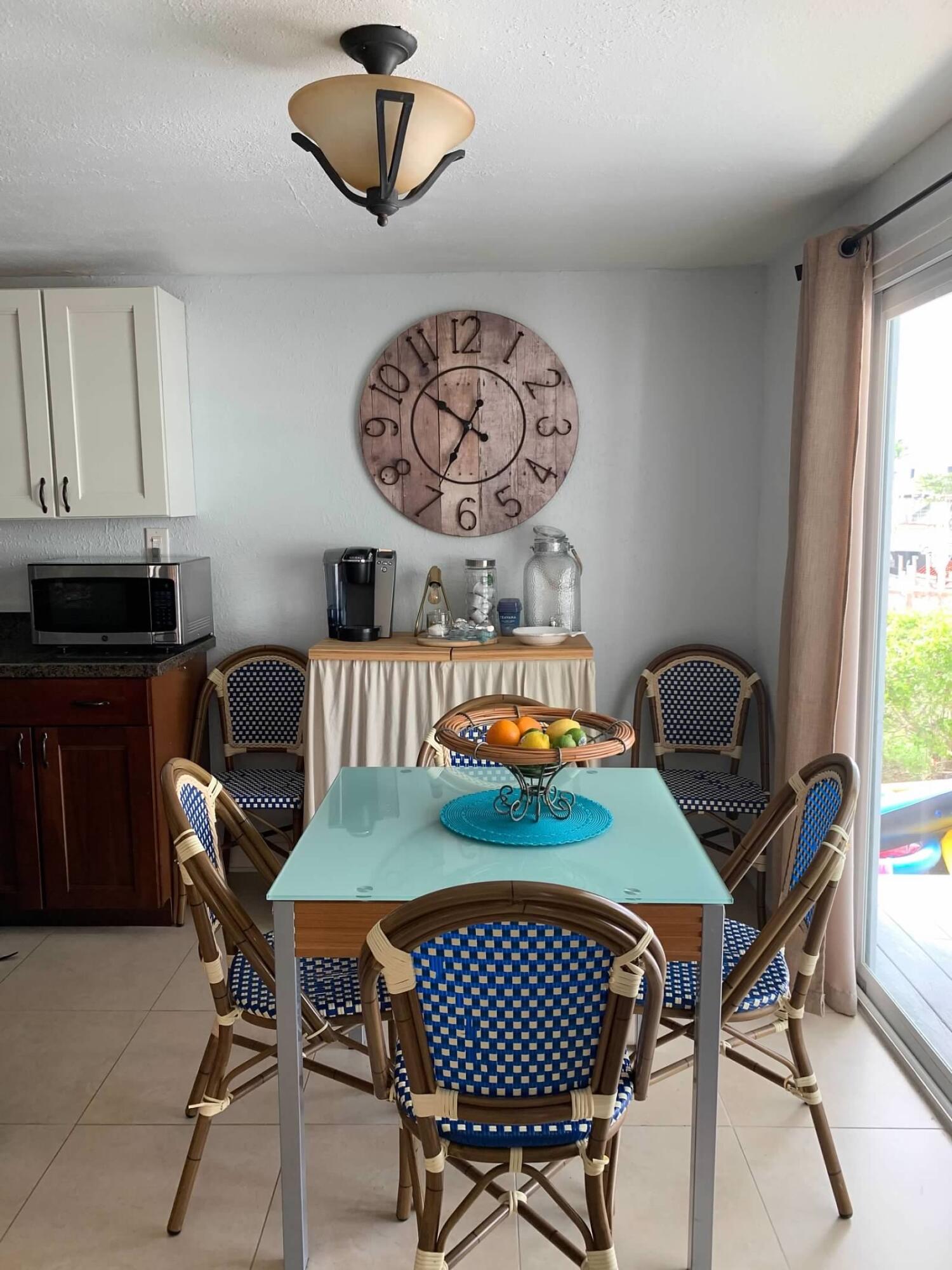 46 Ocean Drive Key Largo, FL 33037 - Photo 4 of 15 a dining room with furniture and window