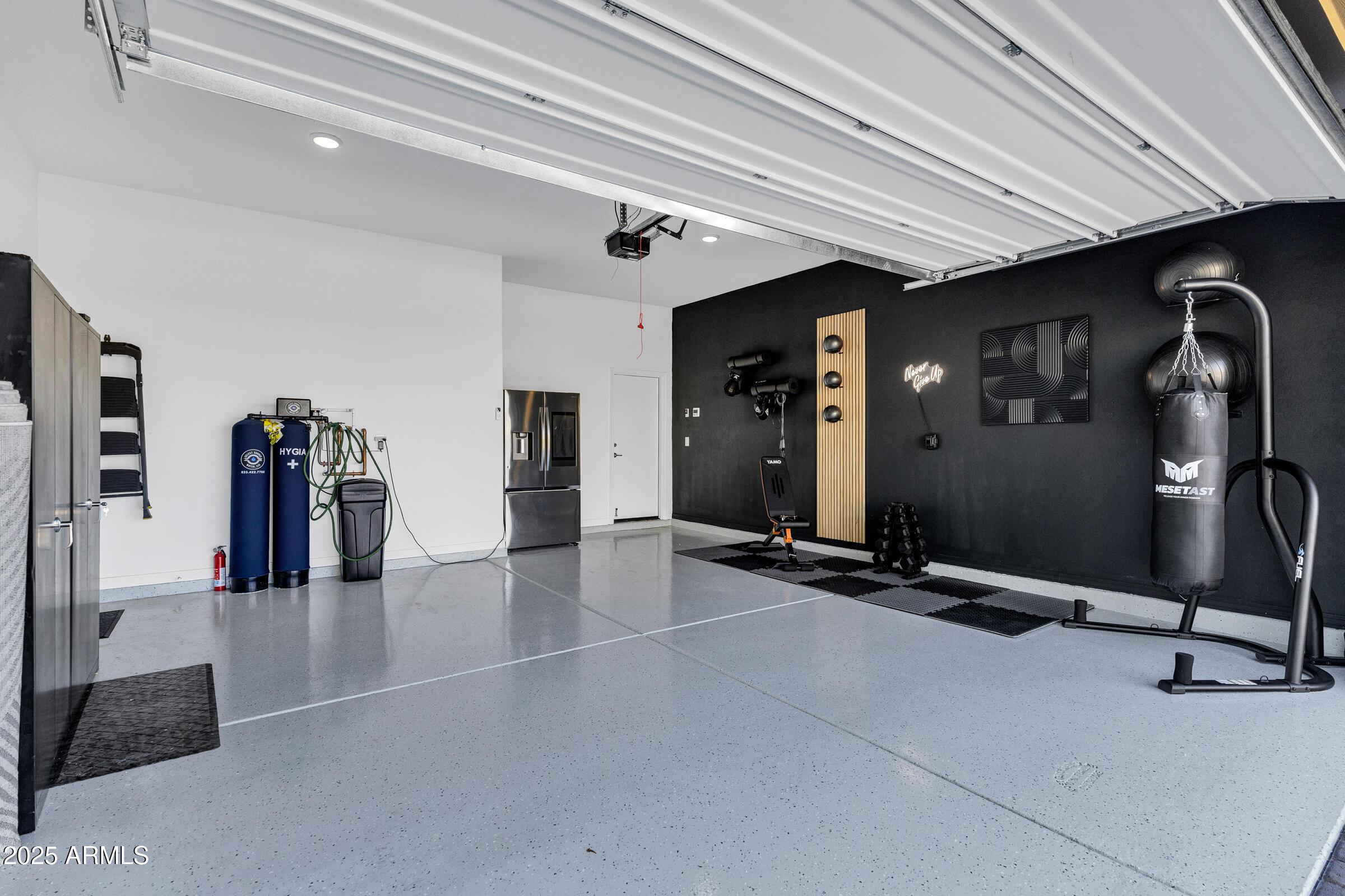 23025 East Happy Road Queen Creek, AZ 85142 - Photo 21 of 31 a view of a room with gym equipment