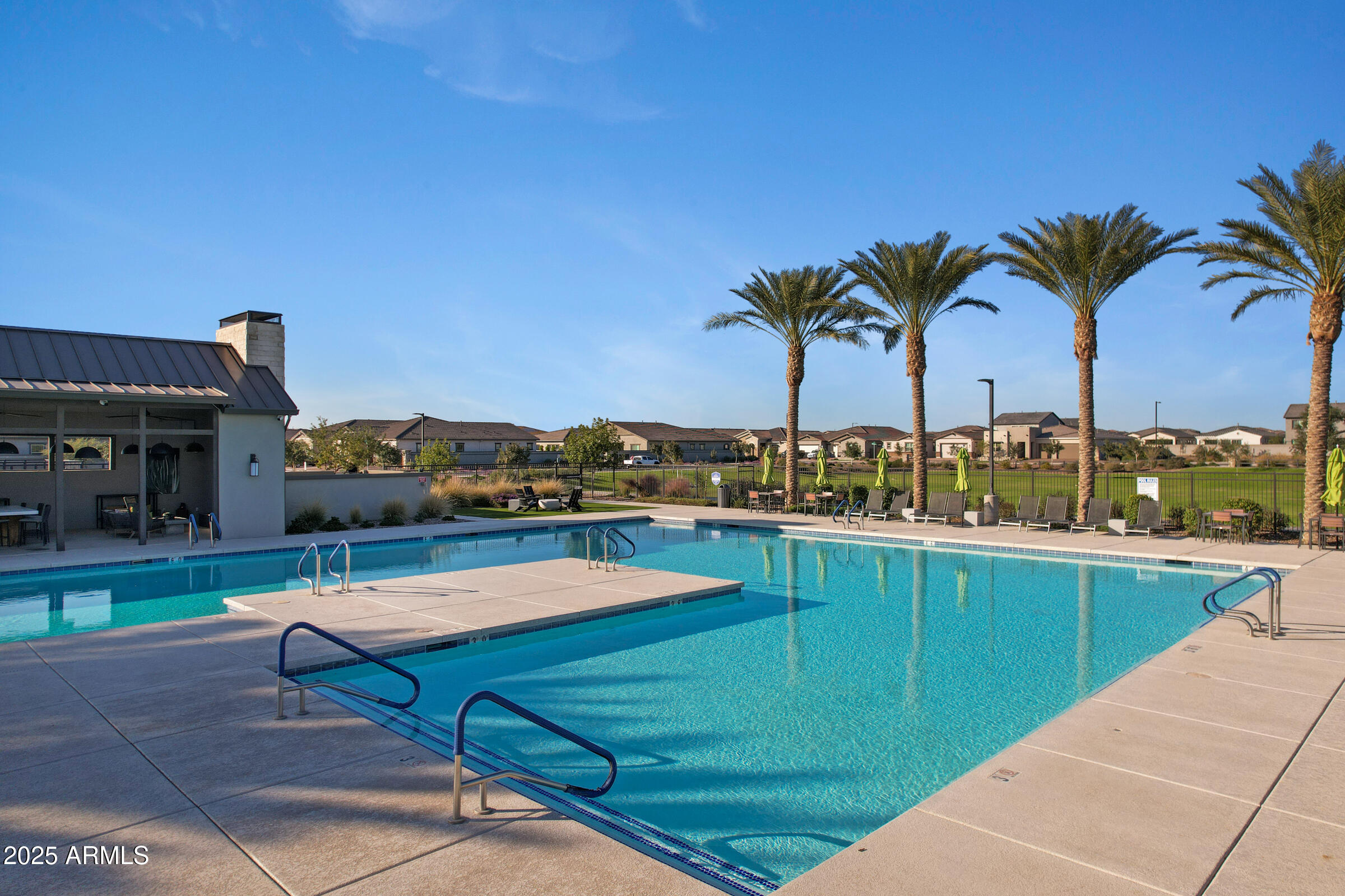 23025 East Happy Road Queen Creek, AZ 85142 - Photo 27 of 31 a view of swimming pool with outdoor seating and plants