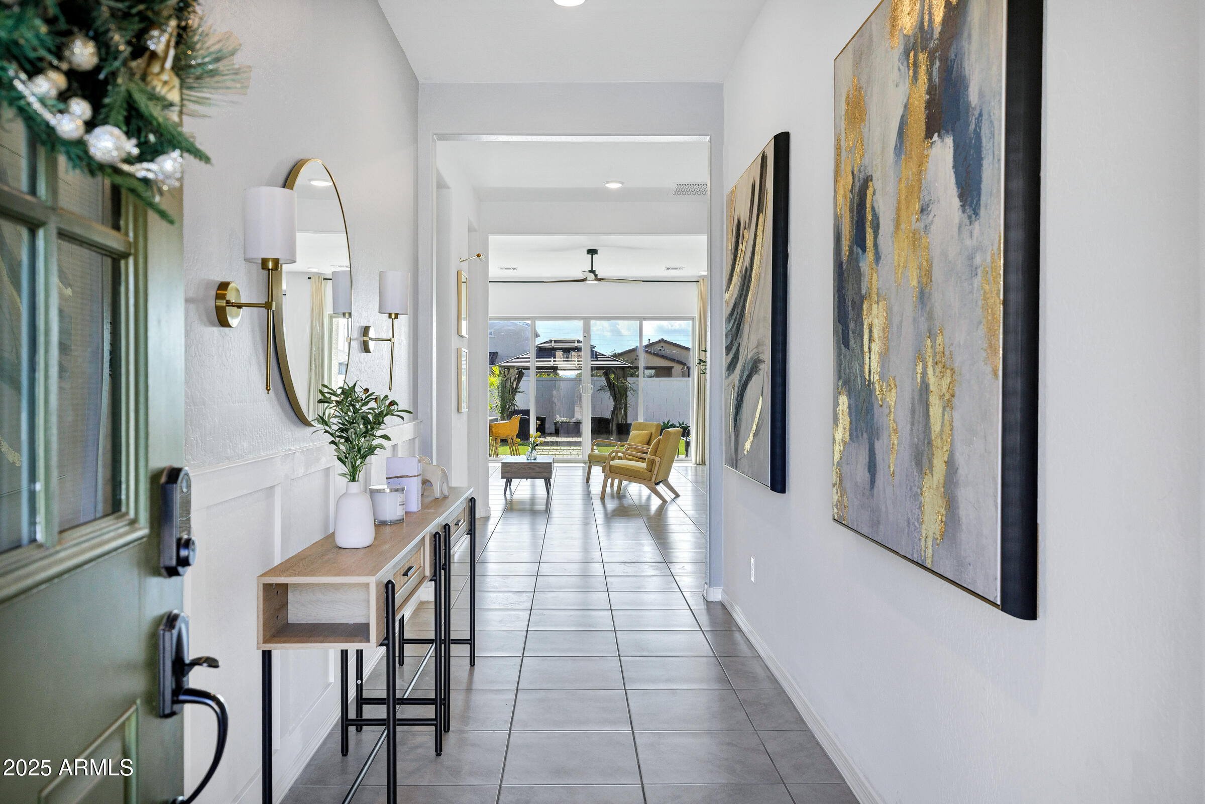 23025 East Happy Road Queen Creek, AZ 85142 - Photo 4 of 31 a dining room with furniture and a floor to ceiling window