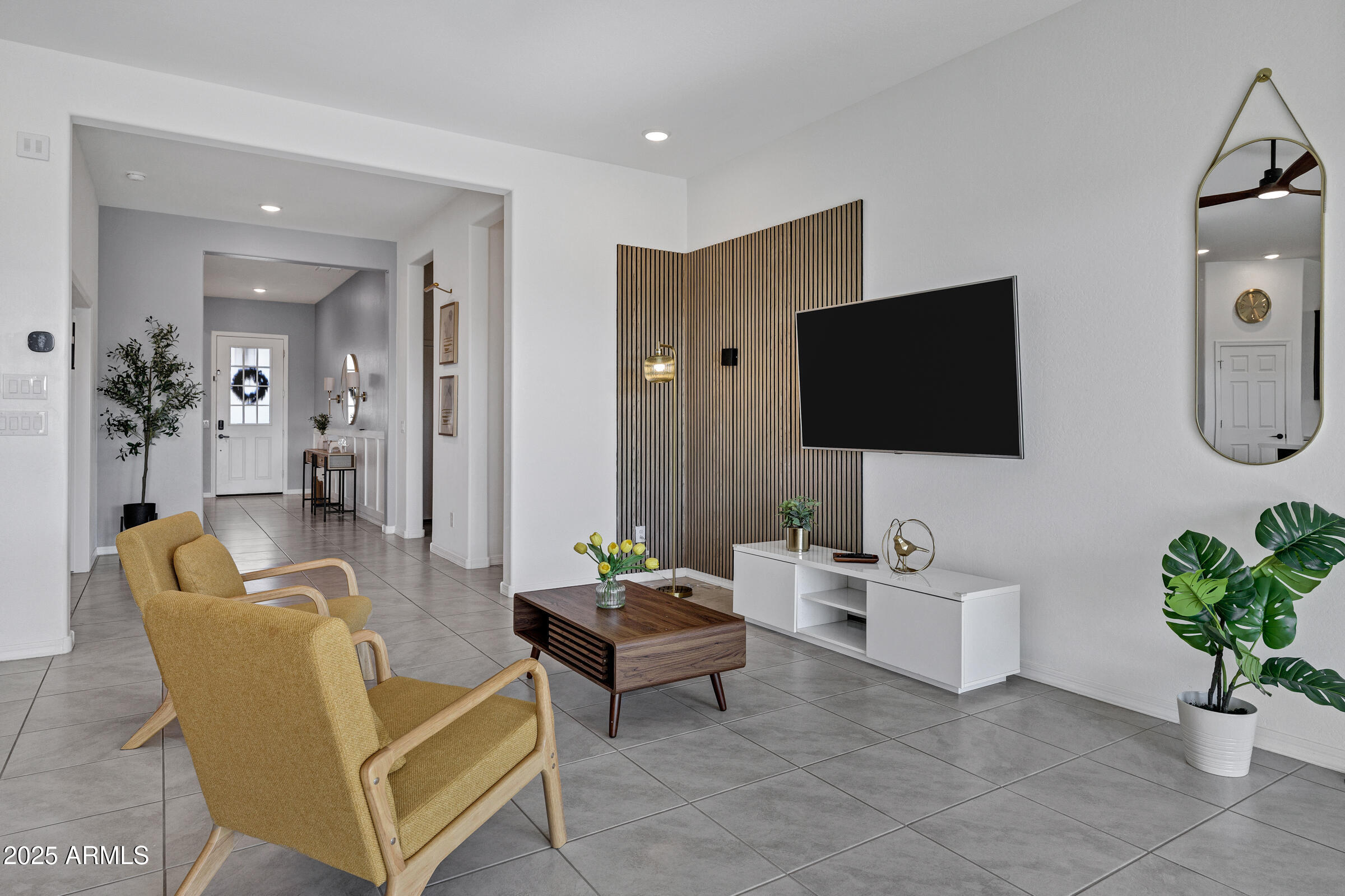 23025 East Happy Road Queen Creek, AZ 85142 - Photo 8 of 31 a living room with furniture and a flat screen tv