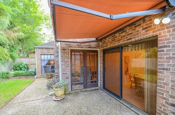 a view of a porch with a backyard