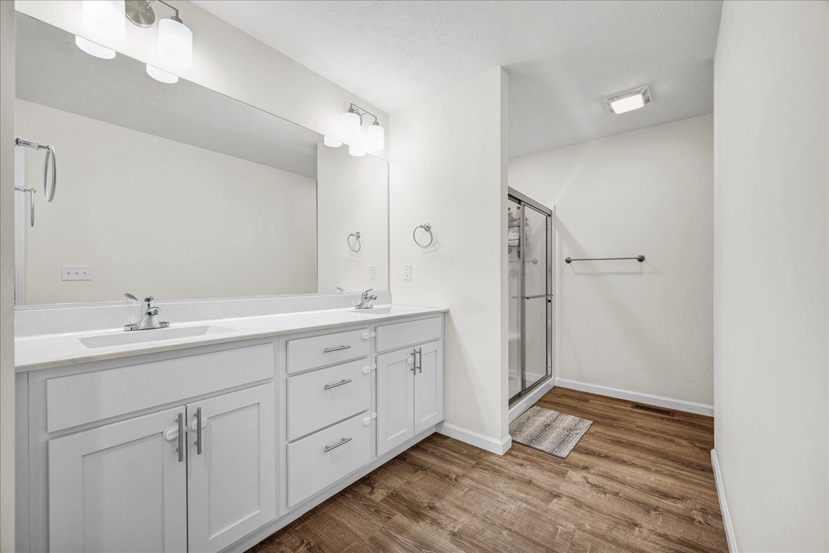 259 Cassidy Road Normal, IL 61761 - Photo 14 of 28 a spacious bathroom with a double vanity sink mirror and double