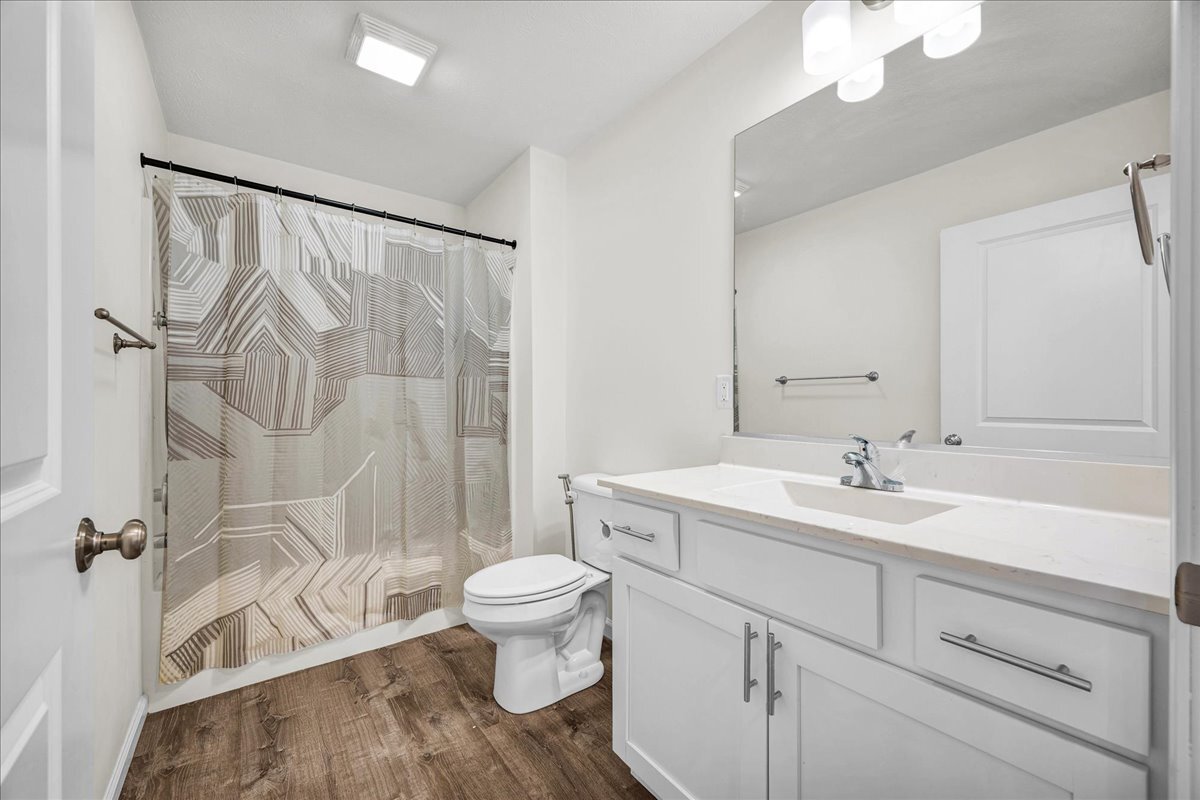 259 Cassidy Road Normal, IL 61761 - Photo 17 of 28 a bathroom with a sink a toilet and shower