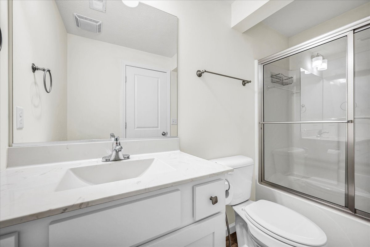 259 Cassidy Road Normal, IL 61761 - Photo 23 of 28 a bathroom with a sink toilet and shower