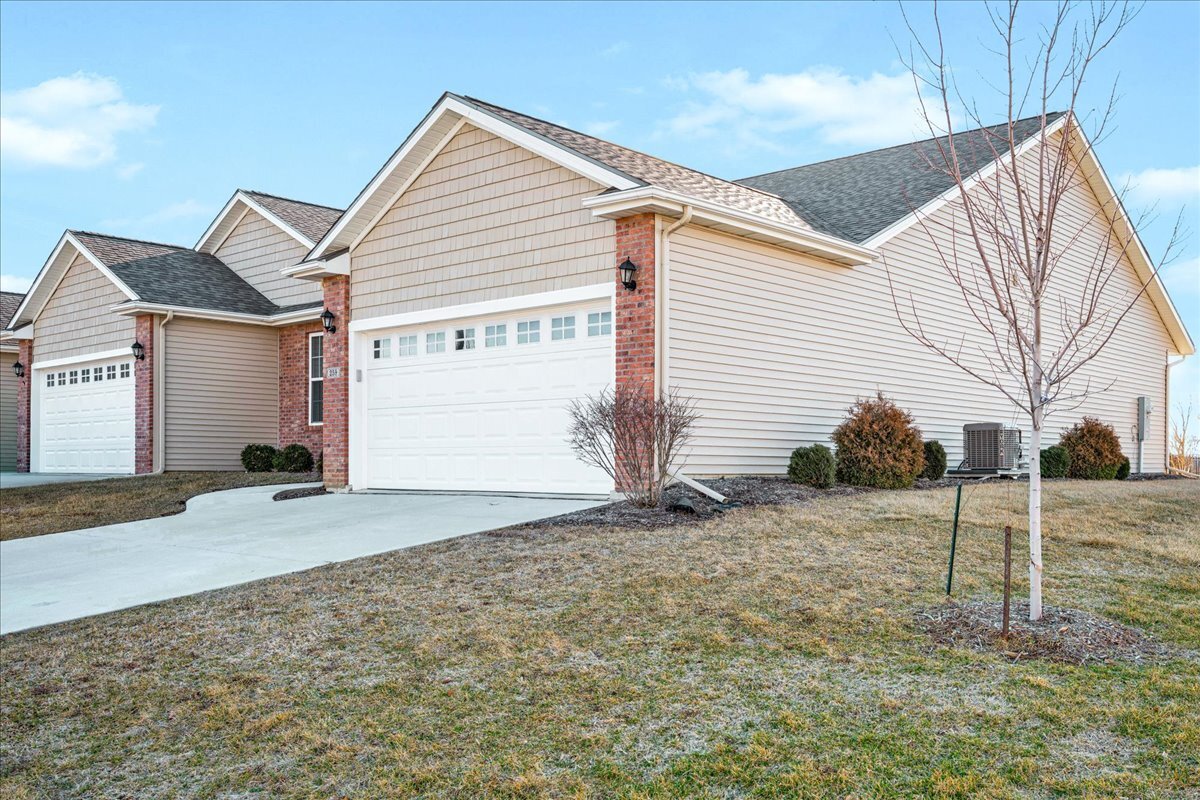 259 Cassidy Road Normal, IL 61761 - Photo 24 of 28 a view of a house with a yard