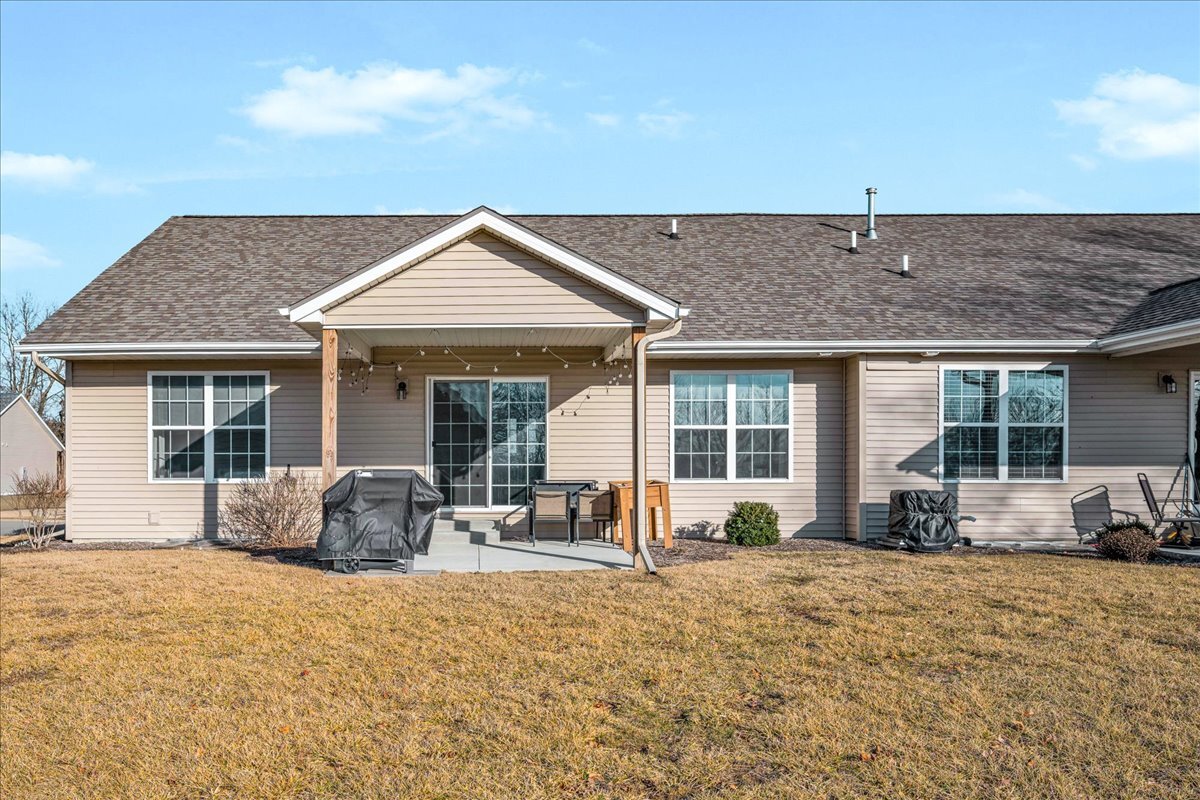 259 Cassidy Road Normal, IL 61761 - Photo 26 of 28 a front view of a house with outdoor seating