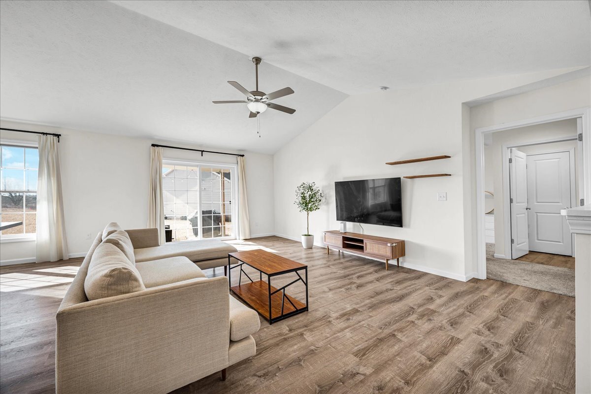 259 Cassidy Road Normal, IL 61761 - Photo 4 of 28 a living room with furniture and a flat screen tv