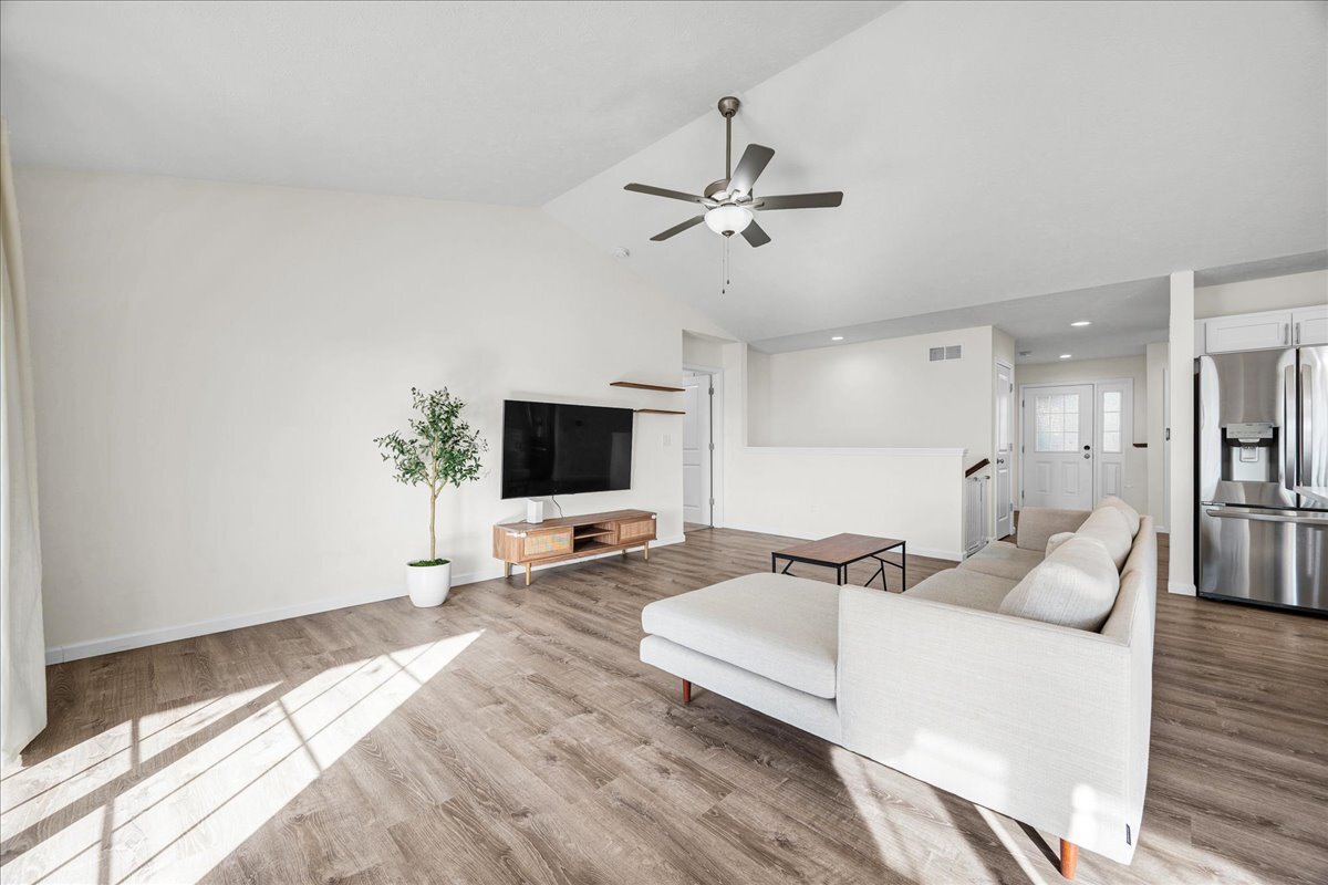 259 Cassidy Road Normal, IL 61761 - Photo 7 of 28 a living room with furniture and a flat screen tv