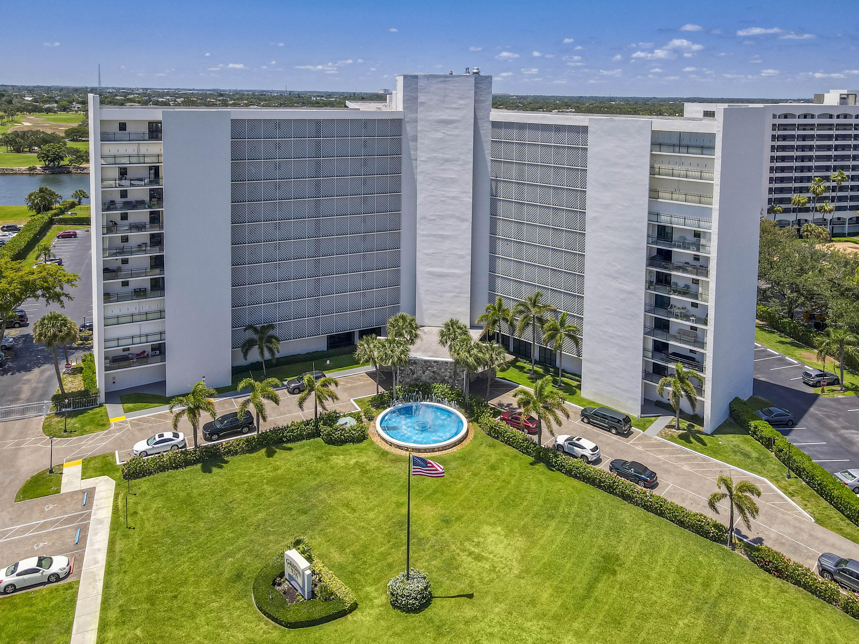 a view of a backyard with plants and a garden