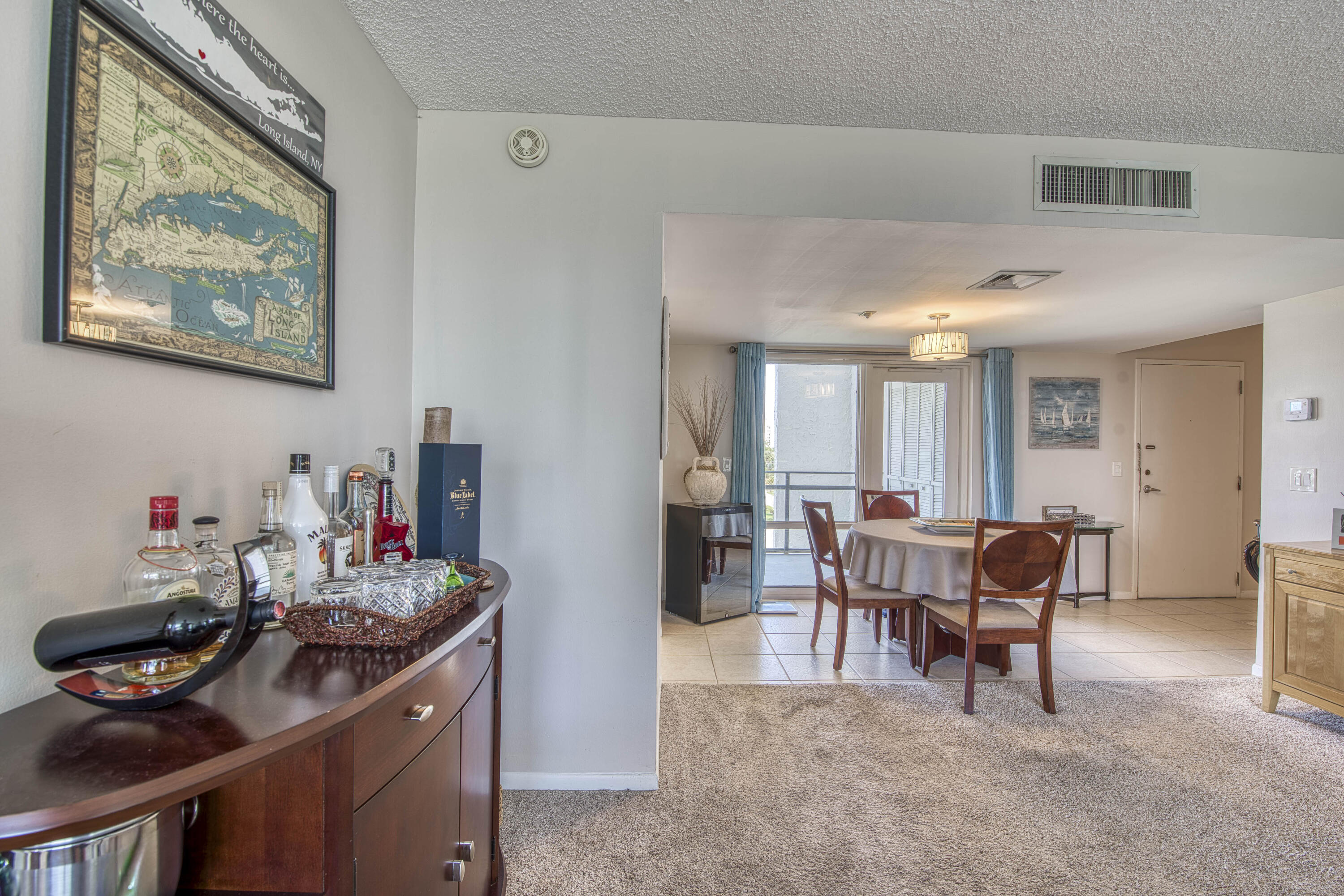336 Golfview Road, Unit 518 North Palm Beach, FL 33408 - Photo 8 of 31 a dining room with furniture and a window