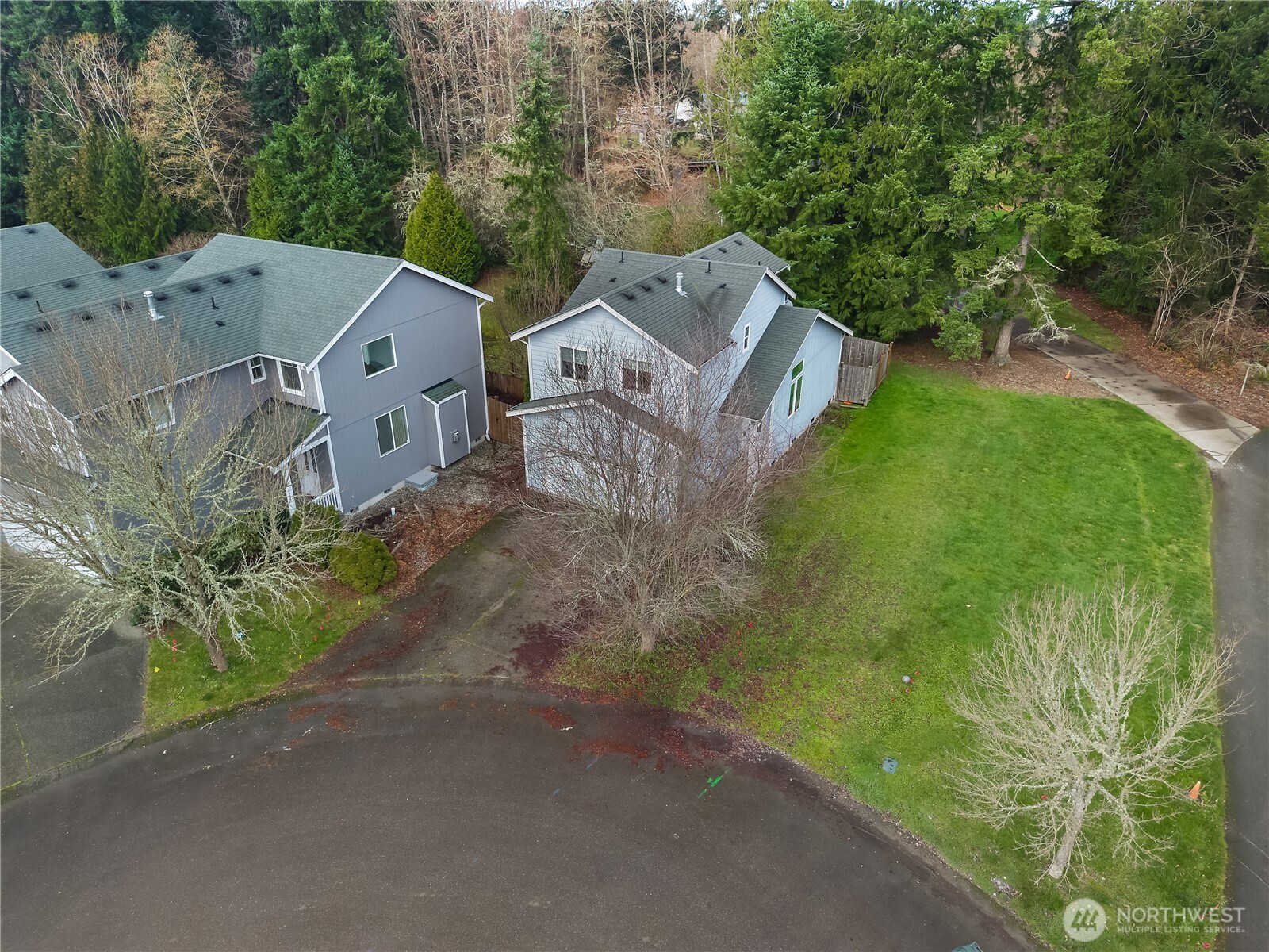 4604 20th Way Northeast Olympia, WA 98516 - Photo 31 of 34 an aerial view of a house with a yard
