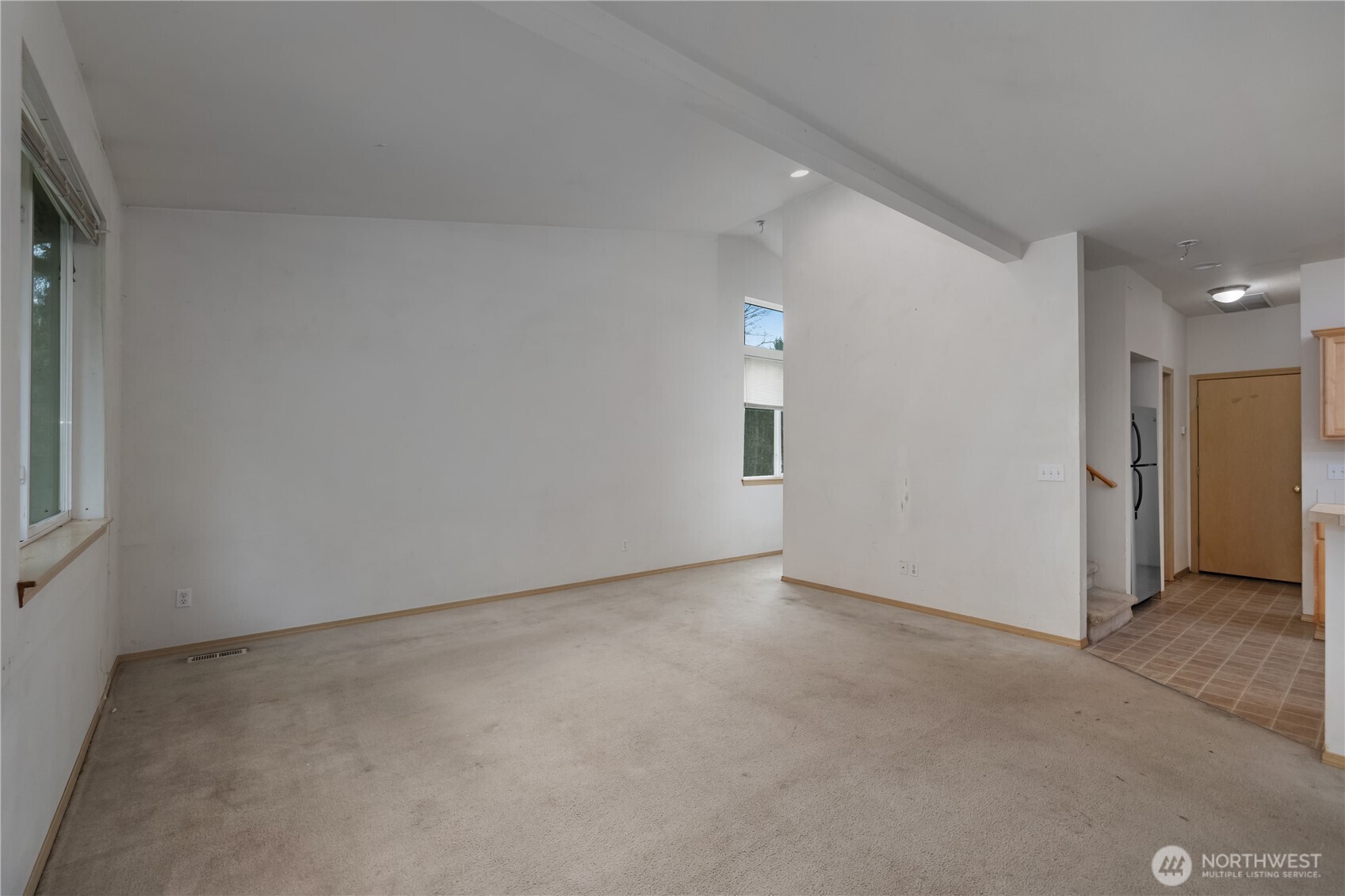 4604 20th Way Northeast Olympia, WA 98516 - Photo 5 of 34 an empty room with a empty space and windows