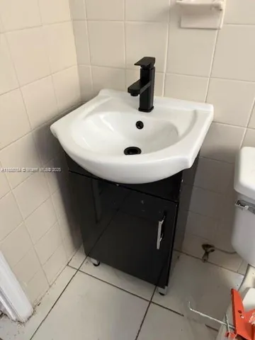 a sink sitting in a bathroom