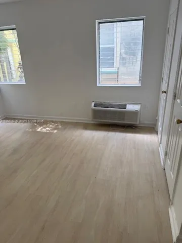 an empty room with window