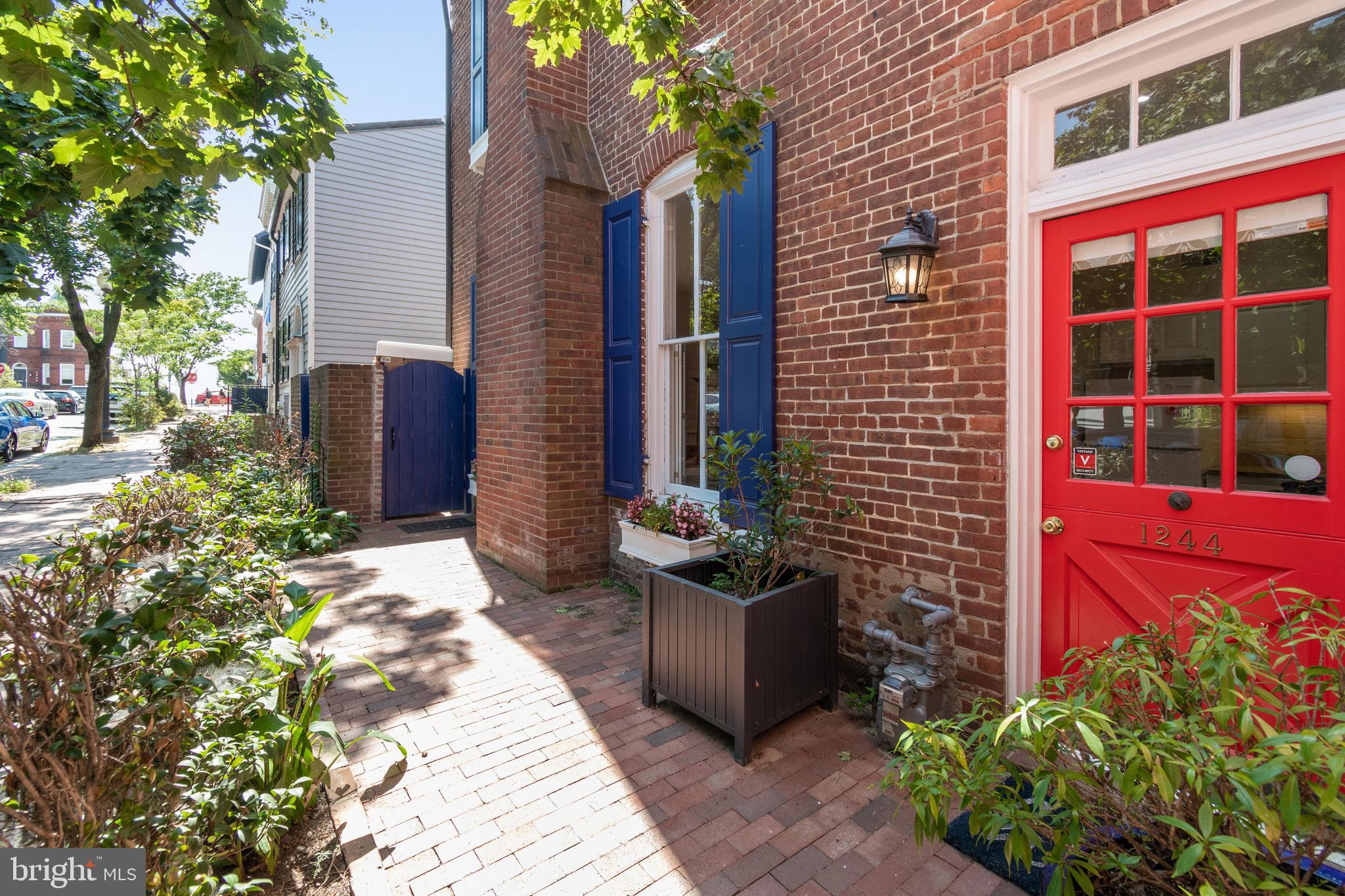 1244 34th Street Northwest Washington, DC 20007 - Photo 2 of 26 a view of a house with potted plants
