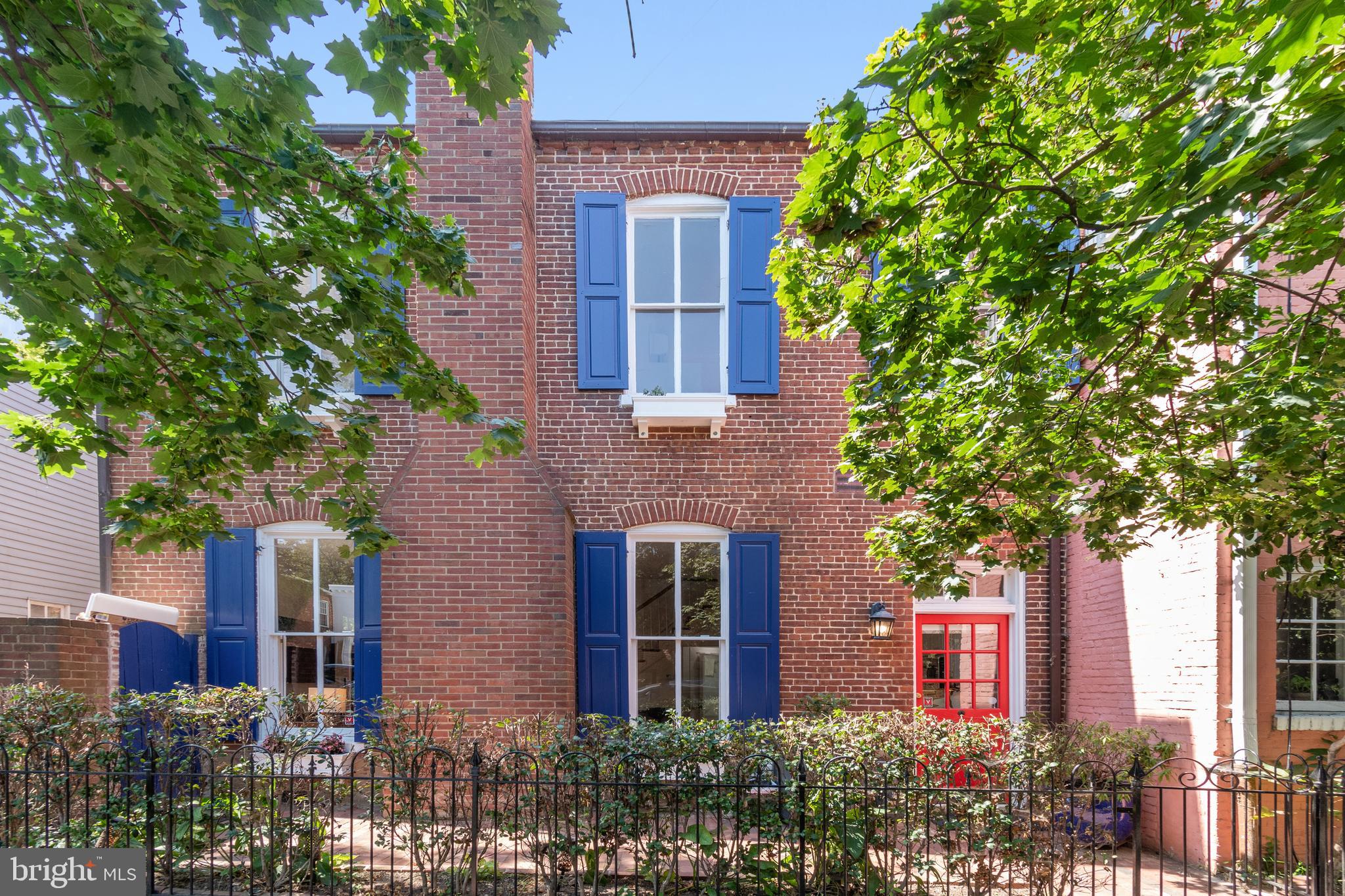 1244 34th Street Northwest Washington, DC 20007 - Photo 5 of 26 front view of a house with a tree