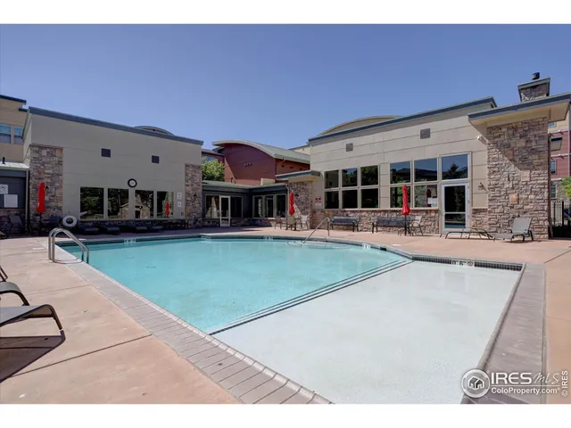 a view of a building with a yard