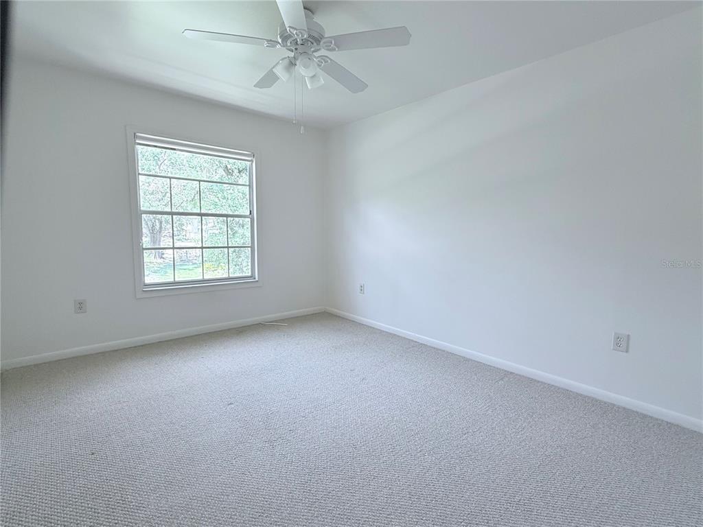 6206 Dewdrop Way Temple Terrace, FL 33617 - Photo 15 of 23 an empty room with a window