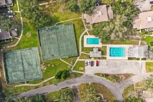 6206 Dewdrop Way Temple Terrace, FL 33617 - Photo 22 of 23 an aerial view of a house with swimming pool and large trees