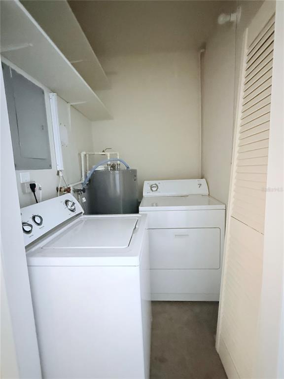 6206 Dewdrop Way Temple Terrace, FL 33617 - Photo 10 of 23 a utility room with dryer and washer