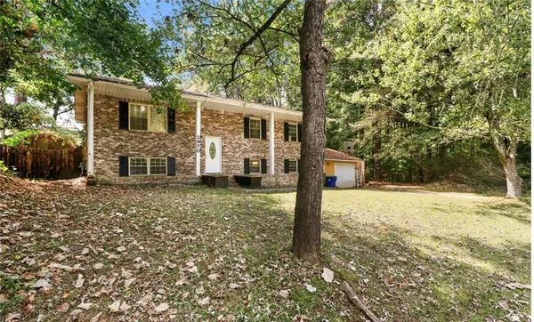 front view of a house with a yard