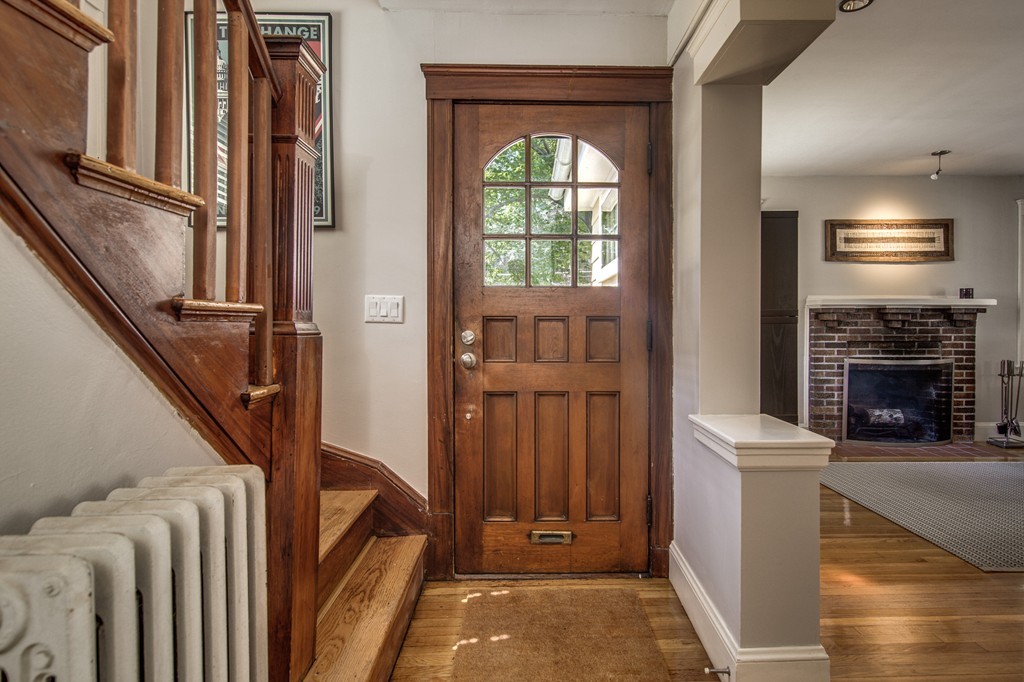 67 Cedar Road Medford, MA 02155 - Photo 13 of 30 a view of an entryway with fireplace