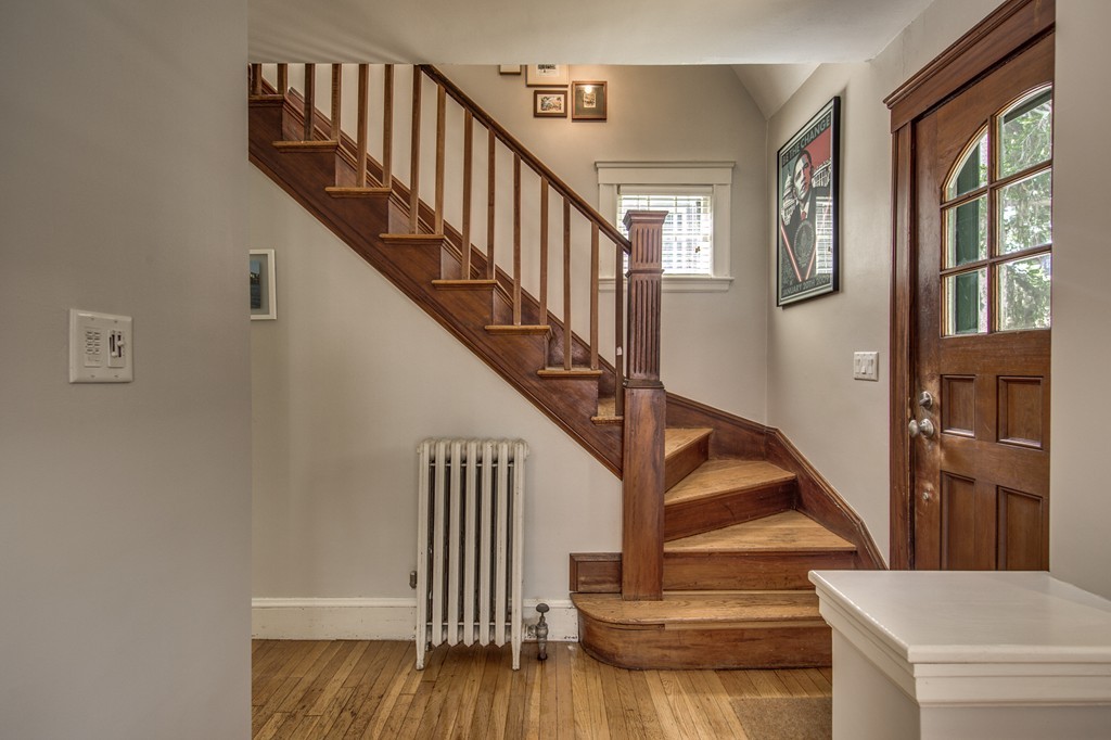 67 Cedar Road Medford, MA 02155 - Photo 14 of 30 a view of entryway and hall with wooden floor