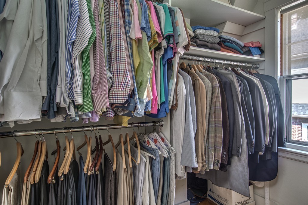 67 Cedar Road Medford, MA 02155 - Photo 17 of 30 a view of walk in closet with clothes and shoes