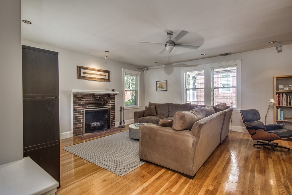 67 Cedar Road Medford, MA 02155 - Photo 2 of 30 a living room with furniture and a fireplace