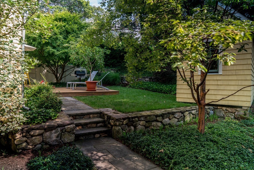 67 Cedar Road Medford, MA 02155 - Photo 25 of 30 a view of a backyard with sitting area