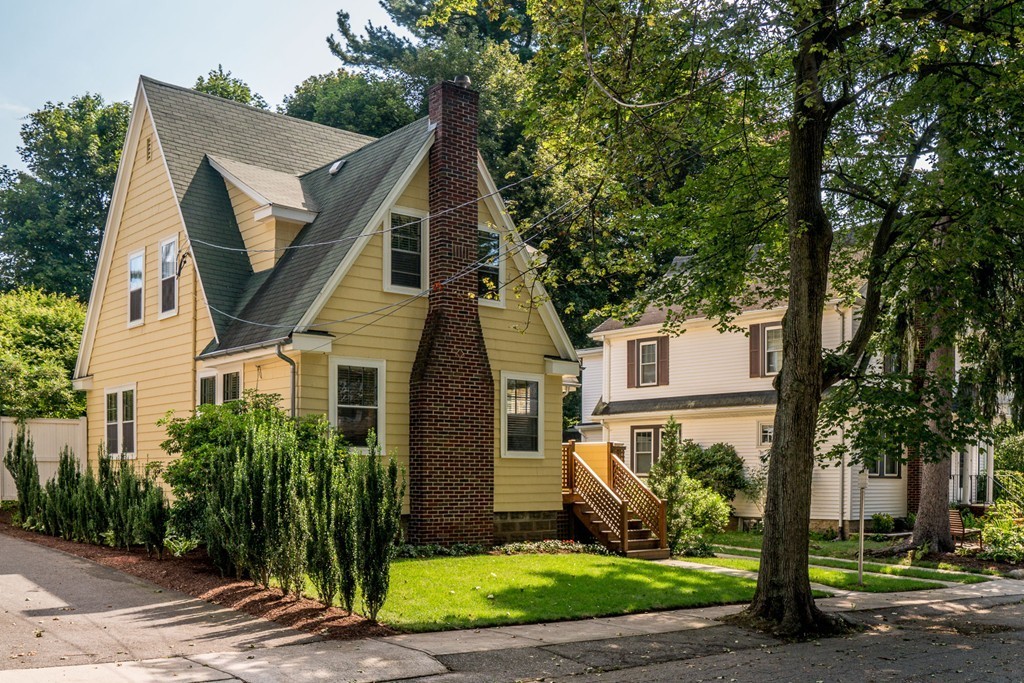 67 Cedar Road Medford, MA 02155 - Photo 27 of 30 a front view of a house with a yard