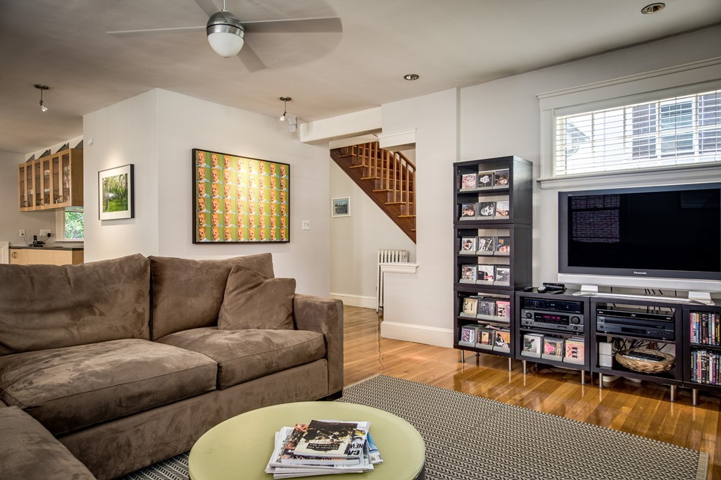 67 Cedar Road Medford, MA 02155 - Photo 4 of 30 a living room with furniture and a flat screen tv