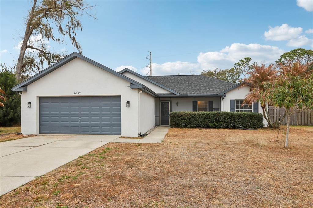 6917 Oakcrest Lane Zephyrhills, FL 33542 - Photo 2 of 54